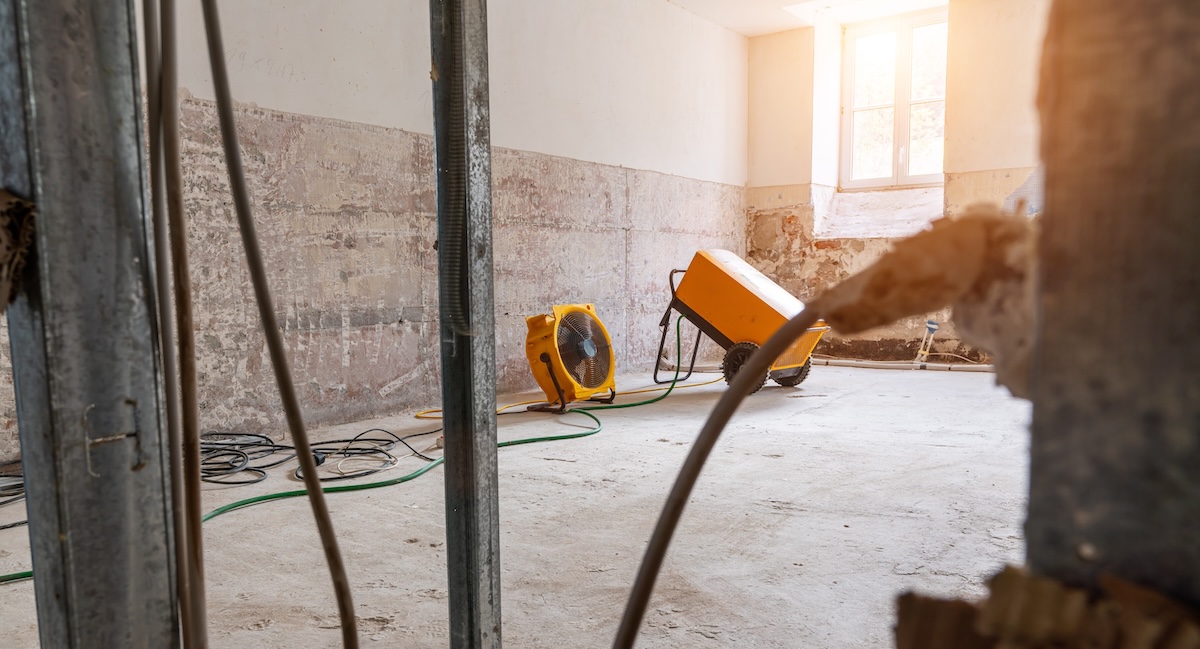 Restoring a home after flood damage with industrial fans and dehumidifiers